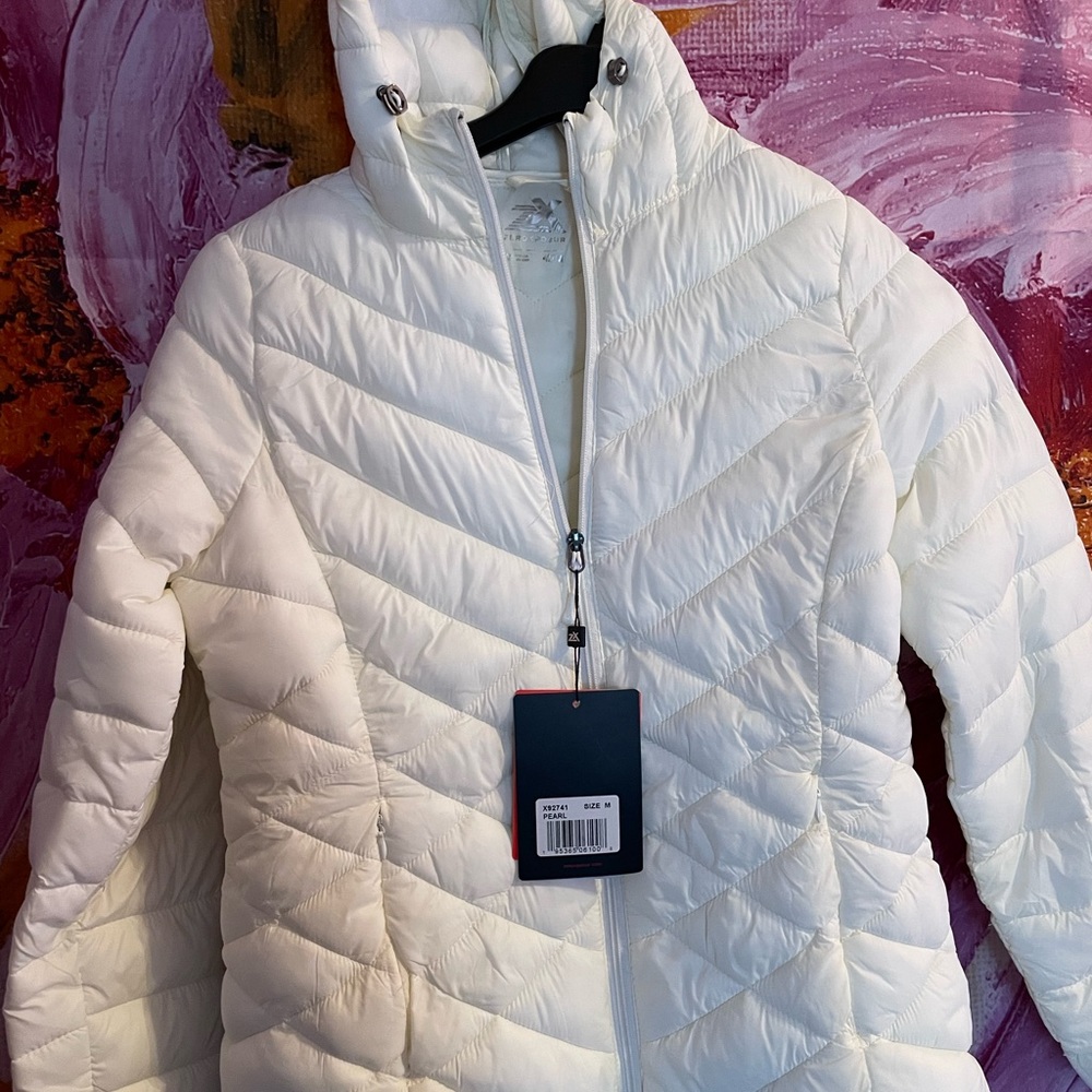 A cream quilted puffer jacket brand new with tags